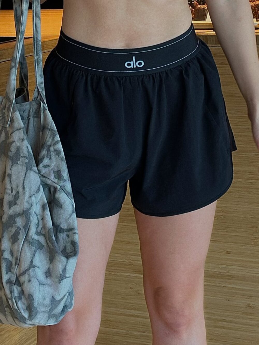 High-waisted Alo workout shorts in black a comfortable versatile choice blending